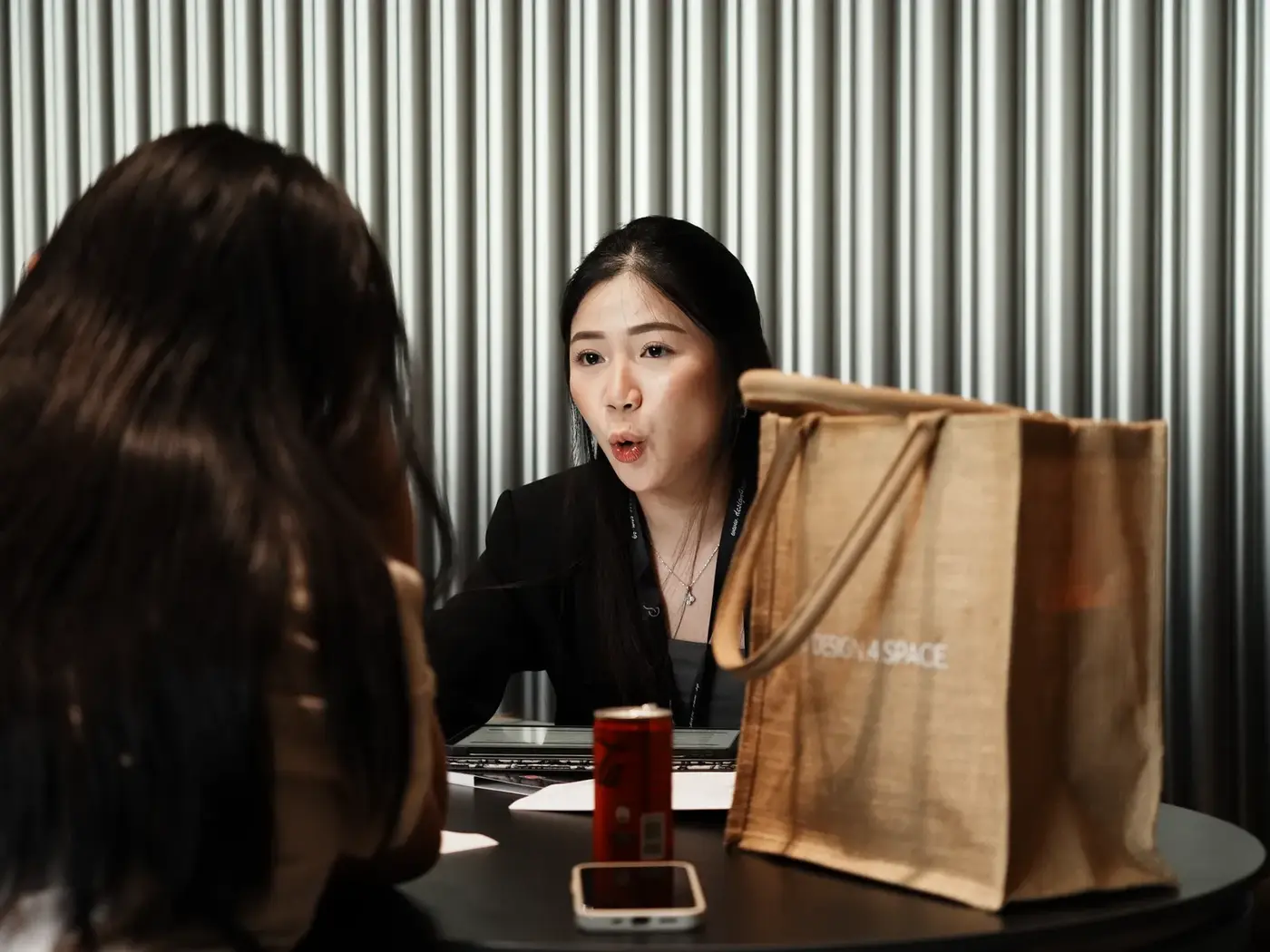 Designer with event goodie bags on the consultation table